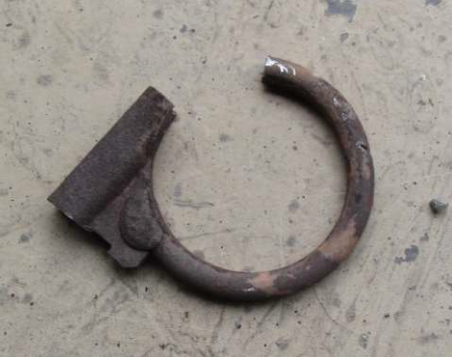 Remnants of the stock exhaust clamp