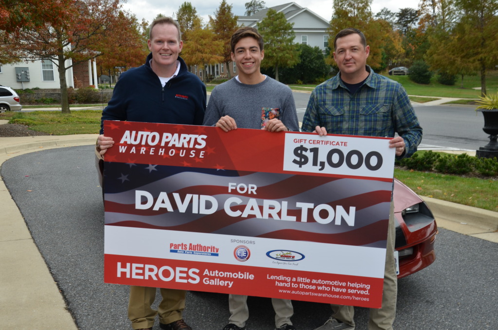 David Carlton, his son Tiler, and Mark Nolan of Auto Parts Warehouse