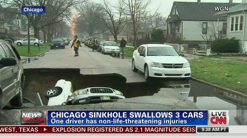 giantgag.com-funny-chicago-sinkhole-swallows-3-cars-gif-01