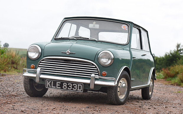 May0064496 Motoring; Pic shows a restored 1966 Mini Cooper S that is being auctioned next week. Seen being driven by Chris Knapman near Taunton, Somerset. 19-8-15