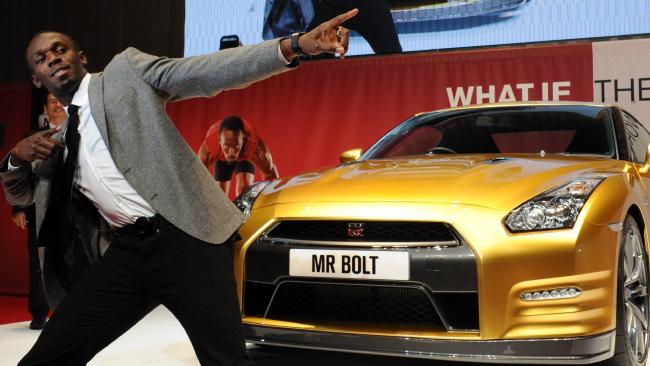 Usain Bolt with his Nissan GT-R via news.com